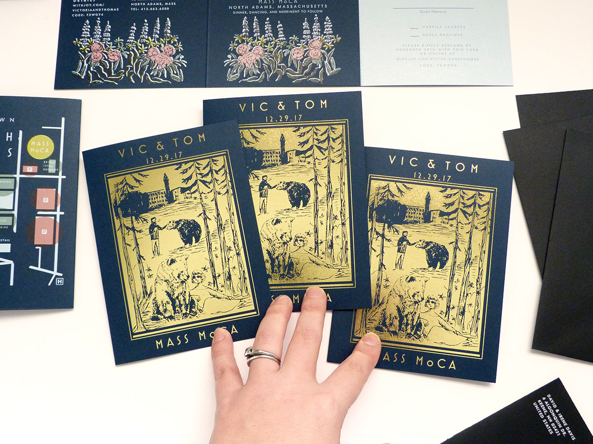 Victoria and Tom custom wedding invitations, MASS MoCA, gold foil, wedding map, white ink, blue paper