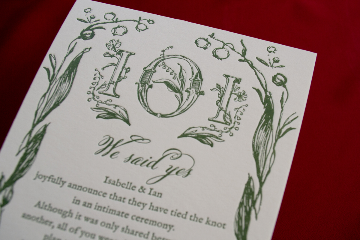 jolly edition letterpress wedding announcement with custom lily-of-the-valley monogram